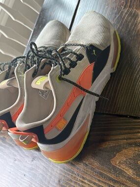 Puma Men’s white, Orange & Black Low-Top Sneakers